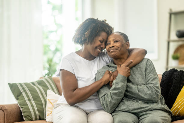 Mother and daughter sharing a warm embrace at home